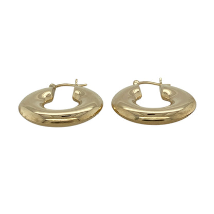 Add timeless simplicity to your jewellery collection with these pre-owned 9ct yellow gold plain hoop creole earrings, featuring a classic polished finish—perfect for everyday wear or effortless styling.

Design: The earrings feature a traditional hoop creole shape with a smooth, plain surface, offering a clean and versatile look that never goes out of style.
Material: Made from 9ct yellow gold, the polished finish enhances the warm tone of the metal, creating a refined and classic appearance.