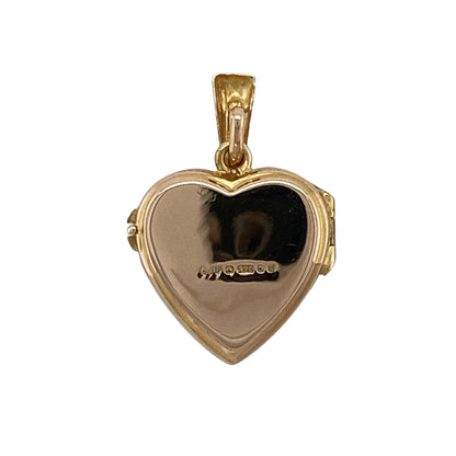 Add a touch of romance to your jewellery collection with this pre-owned 9ct yellow gold heart locket, featuring a delicate floral pattern and timeless design—perfect for everyday wear or meaningful gifting.

Design: The locket is styled in a classic heart shape, adorned with a flower-patterned surface that adds texture and feminine charm.
Material: Made from 9ct yellow gold, the polished finish enhances the warm tone of the metal while highlighting the intricate detailing.