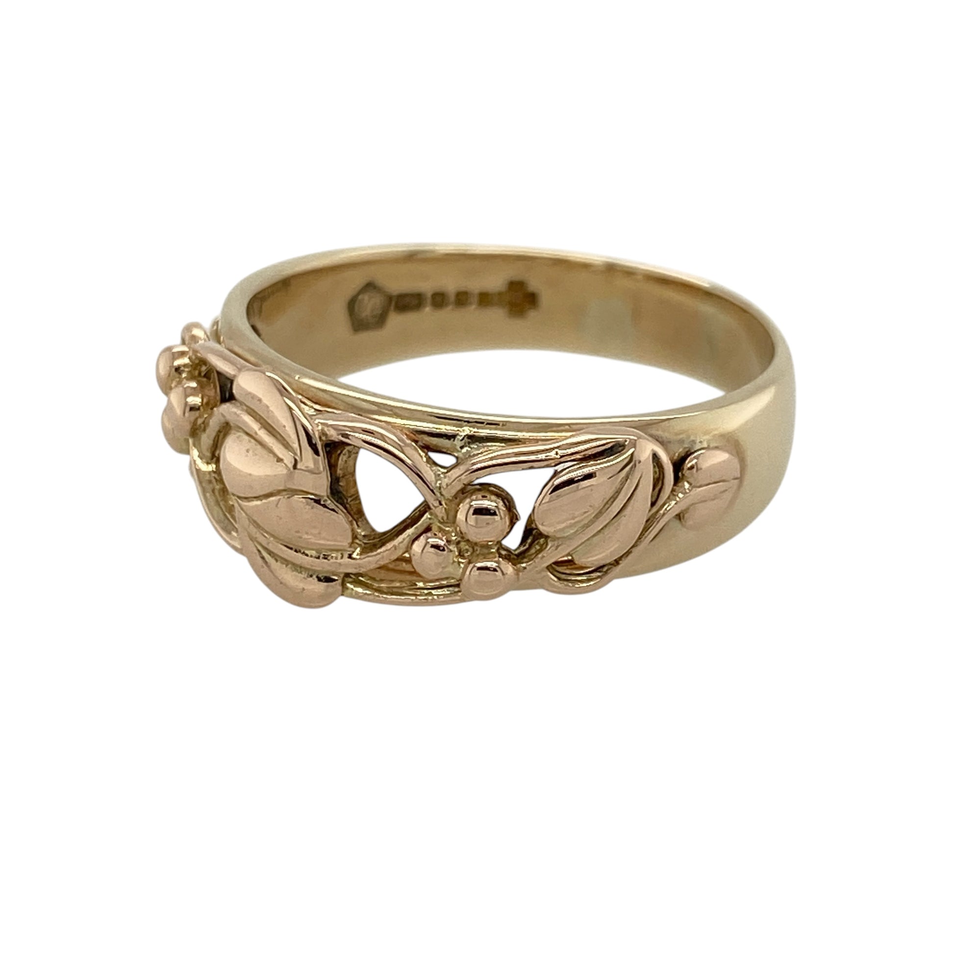 Add meaningful style to your jewellery collection with this pre-owned 9ct yellow and rose gold Tree of Life ring, featuring iconic symbolism and a bold design—perfect for everyday wear or thoughtful gifting.

Design: The ring showcases the Tree of Life motif, symbolising growth, strength, and connection, with intricate detailing that creates a striking and eye-catching look.
Material: Made from 9ct yellow and rose gold by Clogau, the contrasting tones enhance the design while adding warmth and character.