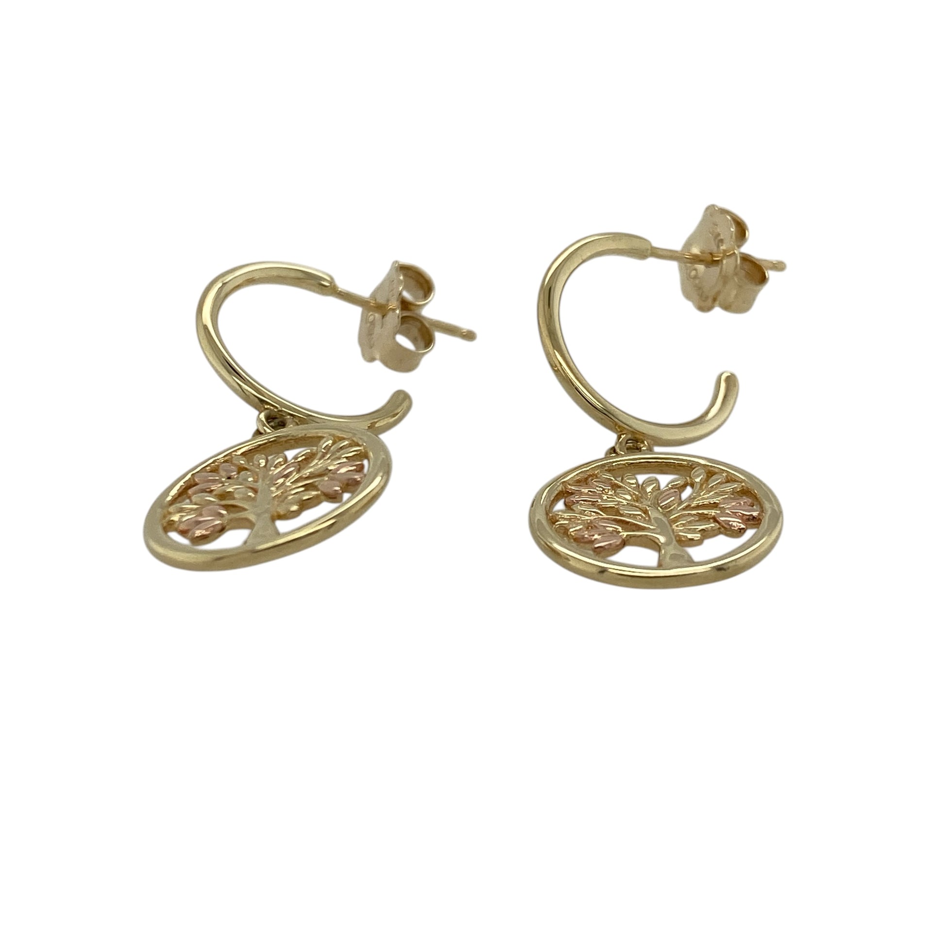 Add meaningful elegance to your jewellery collection with these pre-owned 9ct yellow gold Tree of Life drop earrings, featuring a symbolic design and graceful movement—perfect for everyday wear or special occasions.

Design: The earrings feature a round drop design showcasing the iconic Tree of Life motif, symbolising growth, strength, and connection, with intricate detailing that creates a striking look.