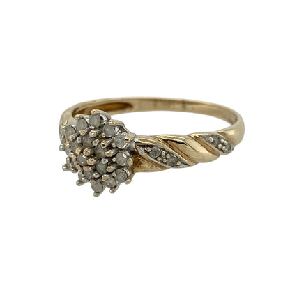 Add elegant sparkle and flowing design to your jewellery collection with this pre-owned 9ct yellow and white gold diamond cluster ring, featuring a graceful twist detail and refined brilliance—perfect for special occasions or everyday wear.

Design: The ring showcases a diamond cluster at the centre, with additional diamonds set along the twisted shoulders, creating a beautiful blend of sparkle and movement.