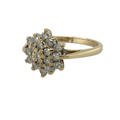 Add bold sparkle and timeless elegance to your jewellery collection with this pre-owned 9ct yellow gold diamond cluster ring, featuring a striking design with impressive brilliance—perfect for special occasions or statement wear.

Design: The ring showcases a diamond cluster at the centre, creating a dazzling focal point with a classic and eye-catching appeal.
Material: Made from 9ct yellow gold, the polished finish enhances the warm tone of the metal while complementing the brilliance of the diamonds.