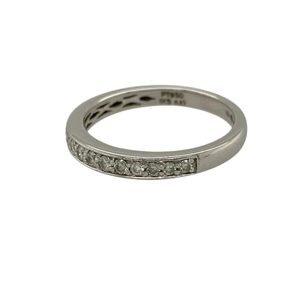 Add understated elegance to your jewellery collection with this pre-owned platinum diamond set band ring, featuring a refined design and subtle sparkle—perfect for everyday wear or stacking.

Design: The ring features a slim band set with diamonds totalling approximately 0.23ct, offering a delicate line of brilliance across the front.
Material: Made from platinum, the naturally bright finish enhances the sparkle of the diamonds while providing a durable and premium feel.
