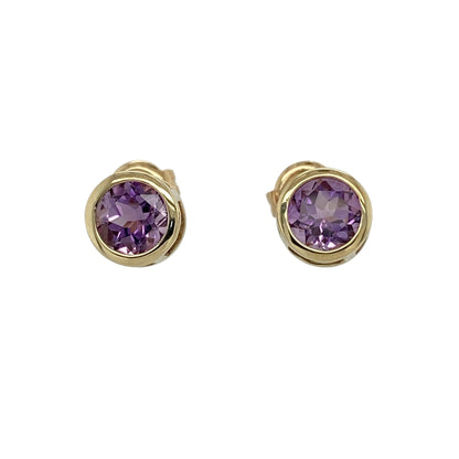 Add a touch of rich colour to your jewellery collection with these pre-owned 9ct yellow gold amethyst stud earrings, featuring a classic design and elegant simplicity—perfect for everyday wear or subtle statement styling.

Design: The earrings feature round amethyst stones measuring approximately 7mm in diameter each, showcasing deep purple tones with a smooth and eye-catching finish.