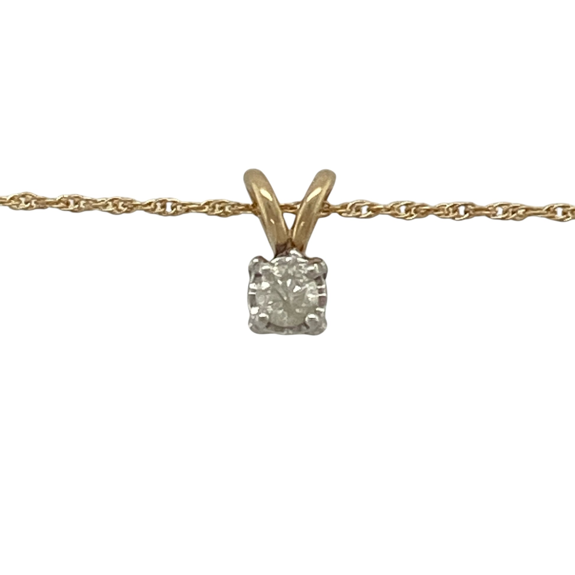 Add timeless sparkle to your jewellery collection with this pre-owned 9ct yellow gold diamond solitaire pendant necklace, featuring a classic design and refined brilliance—perfect for everyday wear or special occasions.

Design: The pendant showcases a single brilliant-cut diamond of approximately 0.15ct, offering a clean and elegant look with eye-catching sparkle.
Material: Made from 9ct yellow gold, the polished finish enhances the warm tone of the metal while complementing the brilliance of the diamond.