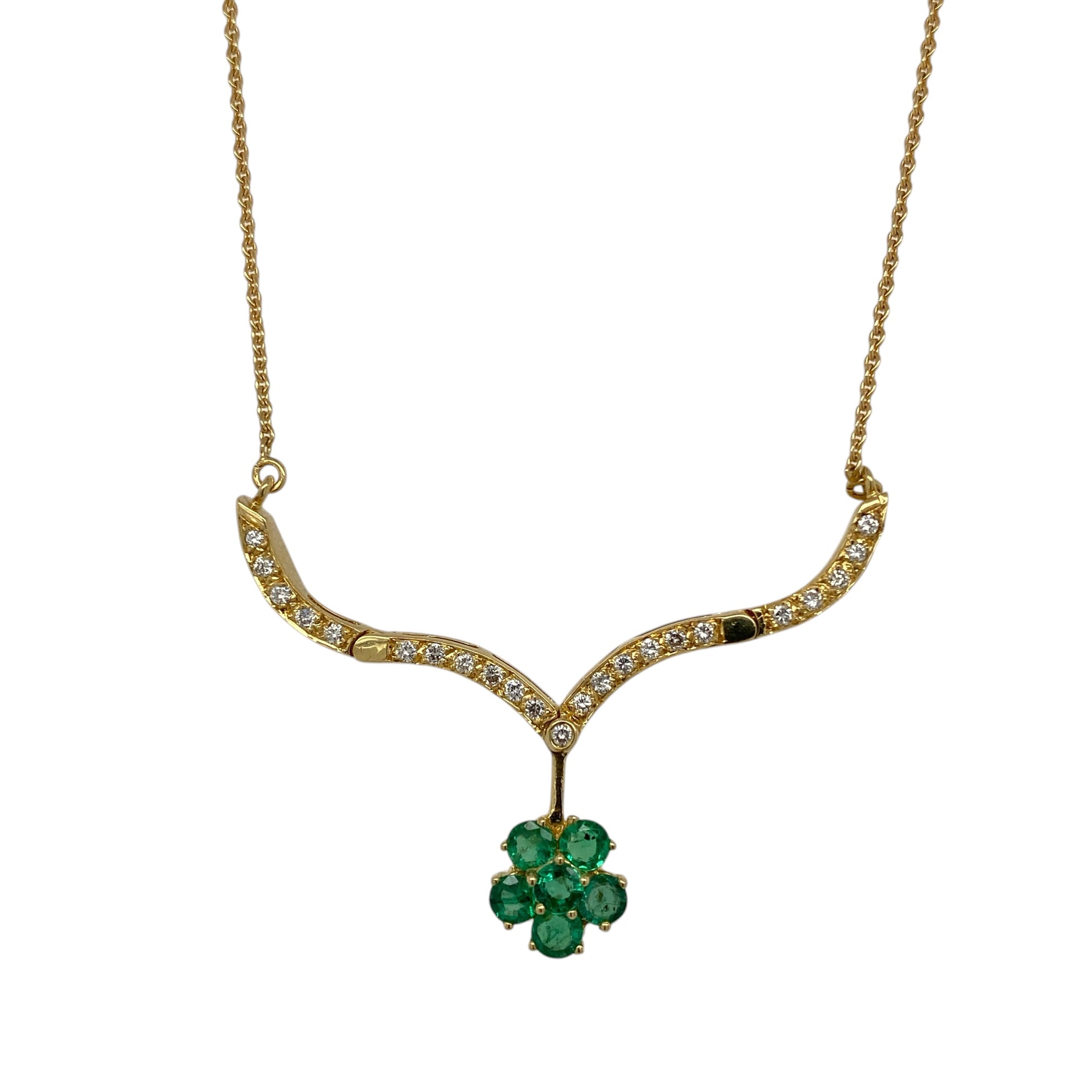 Add elegant versatility and floral-inspired charm to your jewellery collection with this pre-owned 18ct yellow gold diamond and emerald necklace, featuring a refined cluster design with a unique magnetic styling—perfect for special occasions or everyday luxury.

Design: The pendant features a flower-style cluster, with vibrant emerald stones at the centre surrounded by sparkling diamonds, creating a balanced and eye-catching display of colour and brilliance.