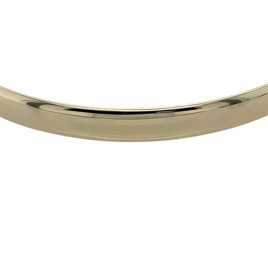Add timeless elegance to your jewellery collection with this pre-owned 9ct yellow gold solid bangle, featuring a classic plain design and substantial feel—perfect for everyday wear or stacking with other pieces.

Design: The bangle features a smooth, plain finish, offering a clean and understated look that never goes out of style.
Material: Made from 9ct solid yellow gold, the polished finish enhances the warm tone of the metal, creating a refined and classic appearance.