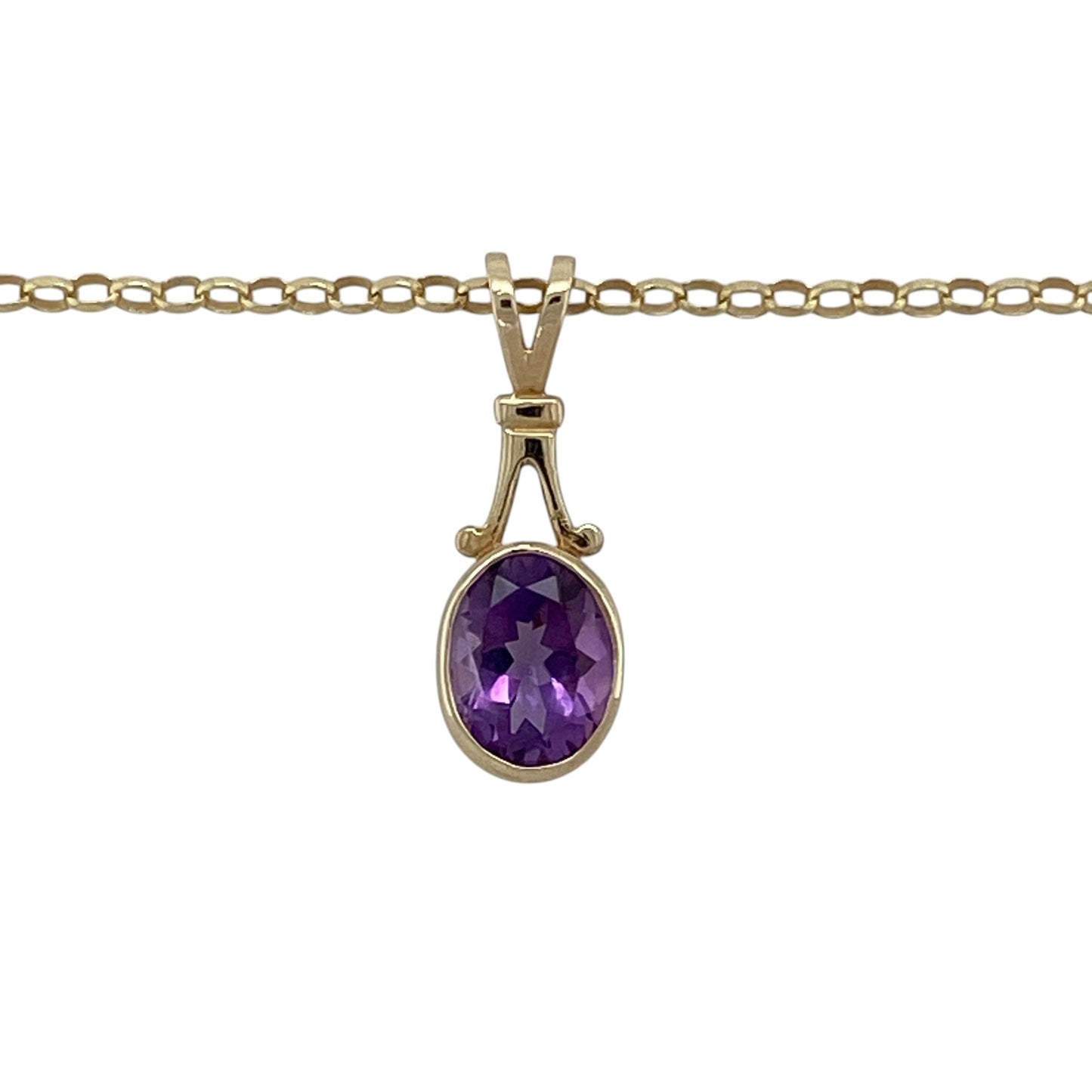 Add rich colour and timeless elegance to your jewellery collection with this pre-owned 9ct yellow gold amethyst pendant necklace, featuring a classic design with a striking centre stone—perfect for everyday wear or special occasions.

Design: The pendant showcases an oval amethyst measuring approximately 8mm by 6mm, offering deep purple tones and a refined, eye-catching look.