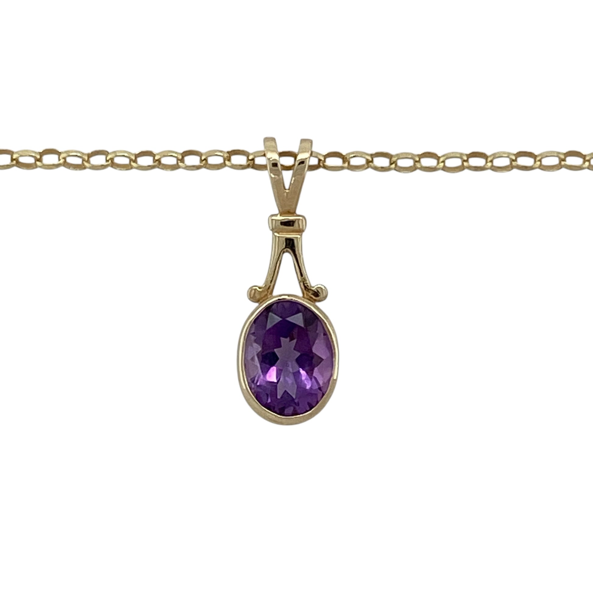 Add rich colour and timeless elegance to your jewellery collection with this pre-owned 9ct yellow gold amethyst pendant necklace, featuring a classic design with a striking centre stone—perfect for everyday wear or special occasions.

Design: The pendant showcases an oval amethyst measuring approximately 8mm by 6mm, offering deep purple tones and a refined, eye-catching look.