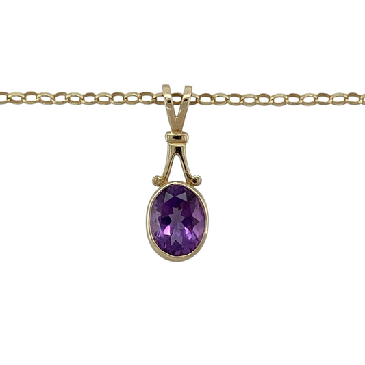 Add rich colour and timeless elegance to your jewellery collection with this pre-owned 9ct yellow gold amethyst pendant necklace, featuring a classic design with a striking centre stone—perfect for everyday wear or special occasions.

Design: The pendant showcases an oval amethyst measuring approximately 8mm by 6mm, offering deep purple tones and a refined, eye-catching look.