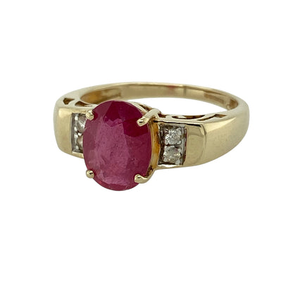 Add rich colour and elegant sparkle to your jewellery collection with this pre-owned 9ct yellow gold ruby and white topaz ring, featuring a classic three-stone design—perfect for special occasions or everyday wear.

Design: The ring showcases an oval ruby measuring approximately 9mm by 7mm at its centre, flanked by two small white topaz stones that add a subtle touch of brilliance and balance.