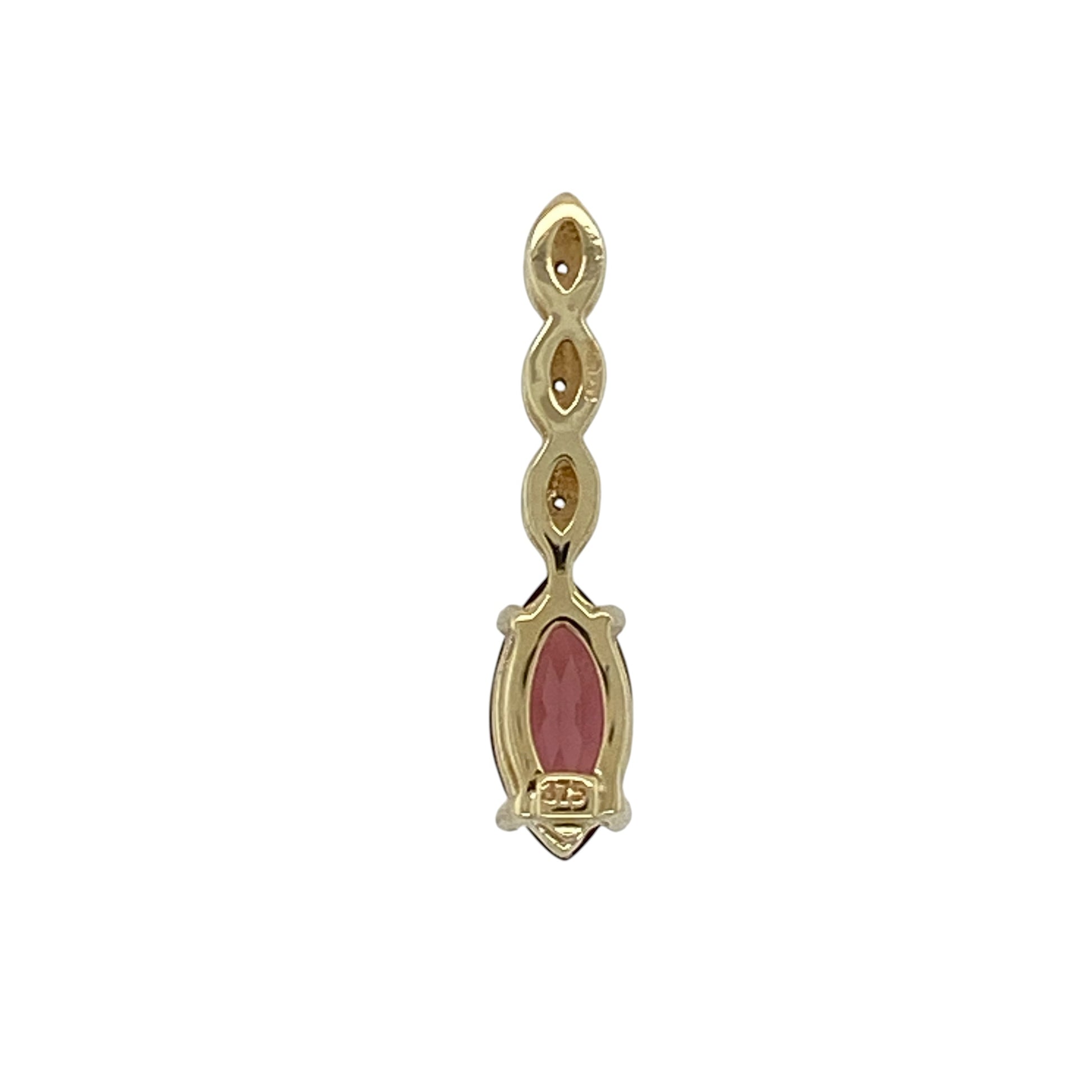 Add rich colour and elegant detail to your jewellery collection with this pre-owned 9ct yellow and white gold garnet pendant, featuring a striking centre stone and delicate sparkle—perfect for everyday wear or special occasions.

Design: The pendant showcases a marquise-cut garnet measuring approximately 10mm by 5mm, offering deep red tones and a refined, elongated shape, complemented by small white stones set into the bail for added brilliance.