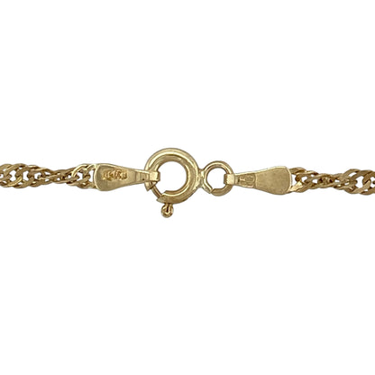 Add elegant shimmer to your jewellery collection with this pre-owned 9ct yellow gold Singapore chain, featuring a distinctive twisted design—perfect for everyday wear or pairing with a pendant.

Design: The chain features a classic Singapore link pattern, with fine twisted strands that create a fluid, light-catching effect.
Material: Made from 9ct yellow gold, the polished finish enhances the warm tone of the metal while highlighting the intricate twist.
