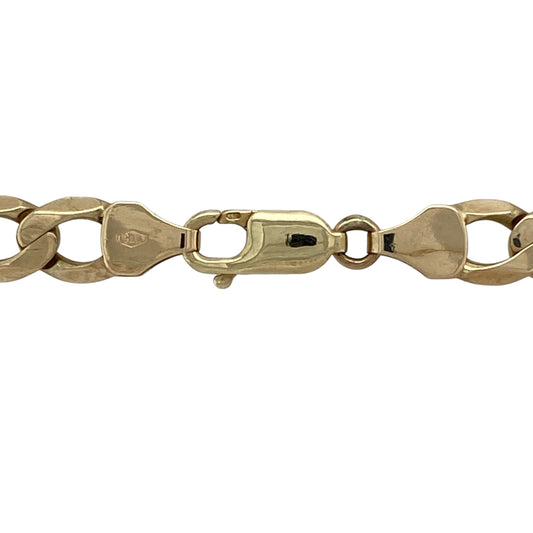 Make a bold statement with this pre-owned 9ct yellow gold curb chain, featuring a substantial weight and striking design—perfect for standout wear or elevating any outfit.

Design: The chain features classic curb links with a smooth, flat profile that reflects the light beautifully, creating a strong and timeless look.
Material: Made from 9ct yellow gold, the polished finish enhances the rich warm tone of the metal, giving a luxurious and eye-catching appearance.