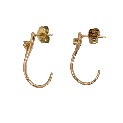 Add warm tones and subtle sparkle to your jewellery collection with these pre-owned 9ct rose gold diamond set hoop style stud earrings, featuring a refined design—perfect for everyday wear or elegant styling.

Design: The earrings are styled in a hoop-inspired stud design, set with diamonds that add a gentle touch of brilliance and enhance the overall look.
Material: Made from 9ct rose gold, the polished finish highlights the soft, warm hue of the metal while complementing the sparkle of the diamonds.