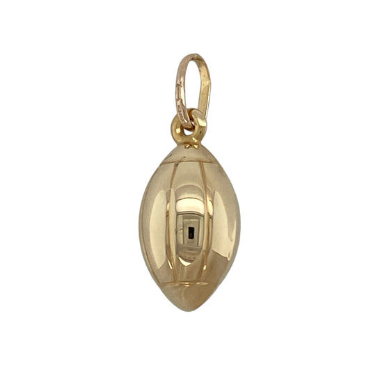Add a sporty touch to your jewellery collection with this pre-owned 9ct yellow gold Welsh rugby ball pendant, featuring a detailed and playful design—perfect for everyday wear or as a meaningful gift.

Design: The pendant is styled as a rugby ball, offering a distinctive and eye-catching look, ideal for rugby fans or those with a connection to Welsh heritage.
Material: Made from 9ct yellow gold, the polished finish enhances the warm tone of the metal while highlighting the detailing of the design.