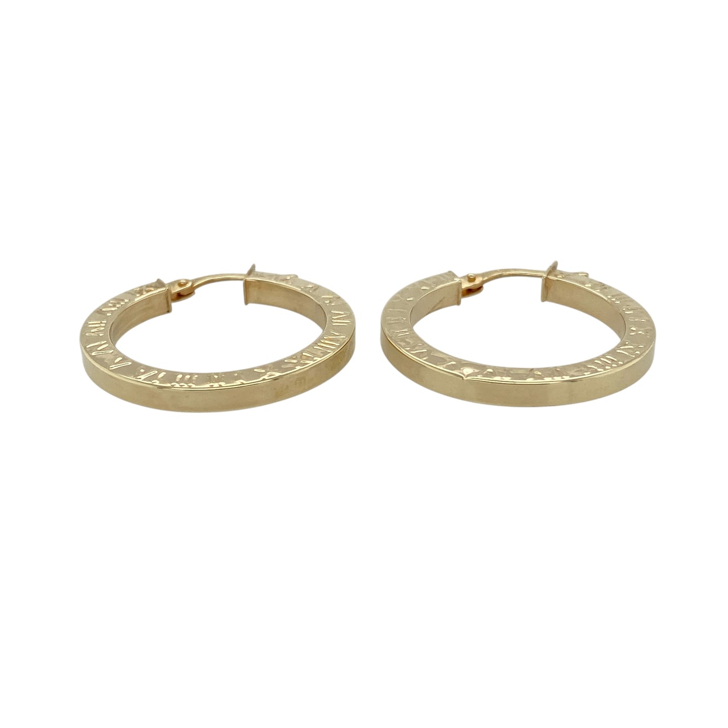 Add a touch of timeless style to your jewellery collection with these pre-owned 9ct yellow gold Roman numeral patterned hoop creole earrings, featuring a classic design with decorative detail—perfect for everyday wear.

Design: The earrings feature a traditional hoop creole shape with a Roman numeral patterned finish, adding a distinctive and stylish element to a timeless look.
