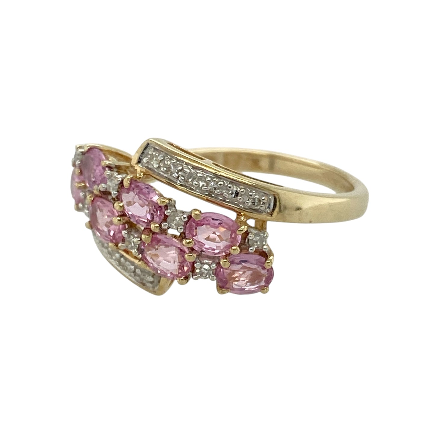 Add vibrant colour and elegant sparkle to your jewellery collection with this pre-owned 9ct yellow gold diamond and pink sapphire cluster ring, featuring a bold and eye-catching design—perfect for special occasions or standout everyday wear.

Design: The ring showcases a cluster of oval pink sapphire stones, complemented by diamonds set in between and along the top and bottom, creating a layered and radiant display of colour and brilliance.