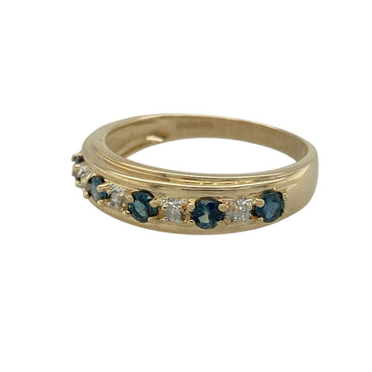Add elegant colour and refined sparkle to your jewellery collection with this pre-owned 9ct yellow gold diamond and sapphire band ring, featuring a bold yet timeless design—perfect for everyday wear or special occasions.

Design: The ring features a band set with sapphires and diamonds, creating a striking contrast of deep blue tones and brilliant sparkle across the front.