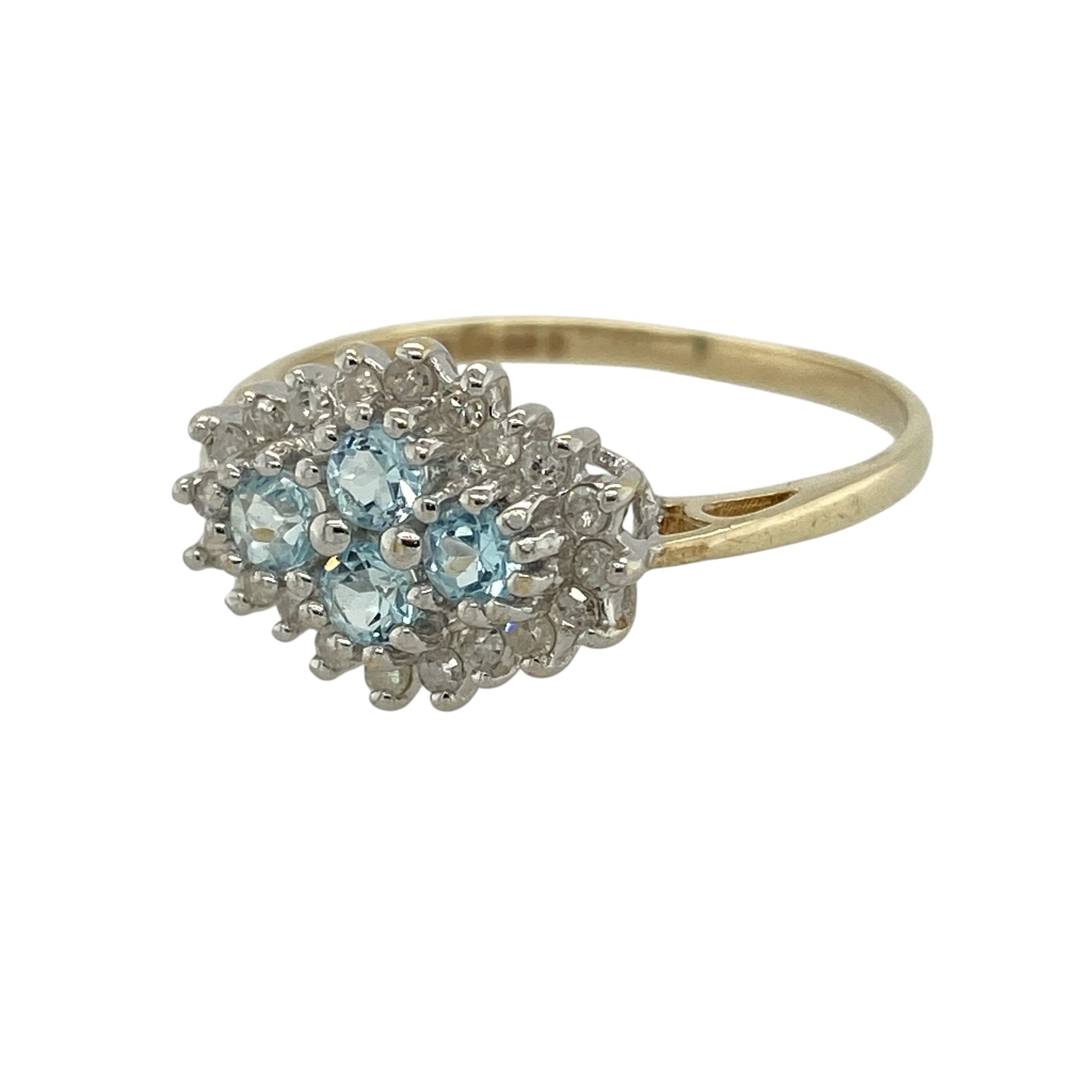 Add soft colour and eye-catching sparkle to your jewellery collection with this pre-owned 9ct yellow gold diamond and aquamarine cluster ring, featuring a bold and elegant design—perfect for special occasions or statement everyday wear.

Design: The ring showcases four aquamarine stones, each approximately 3mm in diameter, arranged in a cluster and surrounded by sparkling diamonds for a bright and balanced look.