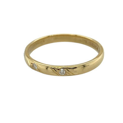 Add refined sparkle and timeless simplicity to your jewellery collection with this pre-owned 18ct yellow gold diamond set band ring, featuring a classic three-stone design—perfect for everyday wear or special occasions.

Design: The ring features three diamonds set across the front, creating a balanced and elegant display of subtle brilliance.
Material: Made from 18ct yellow gold, the polished finish enhances the rich, warm tone of the metal while complementing the sparkle of the diamonds.
