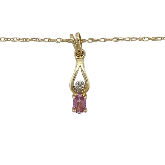 Add a touch of delicate colour and sparkle to your jewellery collection with this pre-owned 9ct yellow gold diamond and pink sapphire pendant necklace, featuring a refined and feminine design—perfect for everyday wear or special occasions.

Design: The pendant showcases an oval pink sapphire measuring approximately 4mm by 3mm, complemented by diamond accents that add a subtle and elegant sparkle.