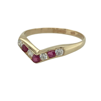 Add a meaningful and elegant touch to your collection with this pre-owned 9ct yellow gold ruby and cubic zirconia wishbone ring—combining delicate sparkle with rich colour in a timeless design.

Design: The ring is styled in a classic wishbone shape, set with alternating ruby and cubic zirconia stones, each approximately 2mm in diameter, creating a contrast of deep red tones and bright sparkle.