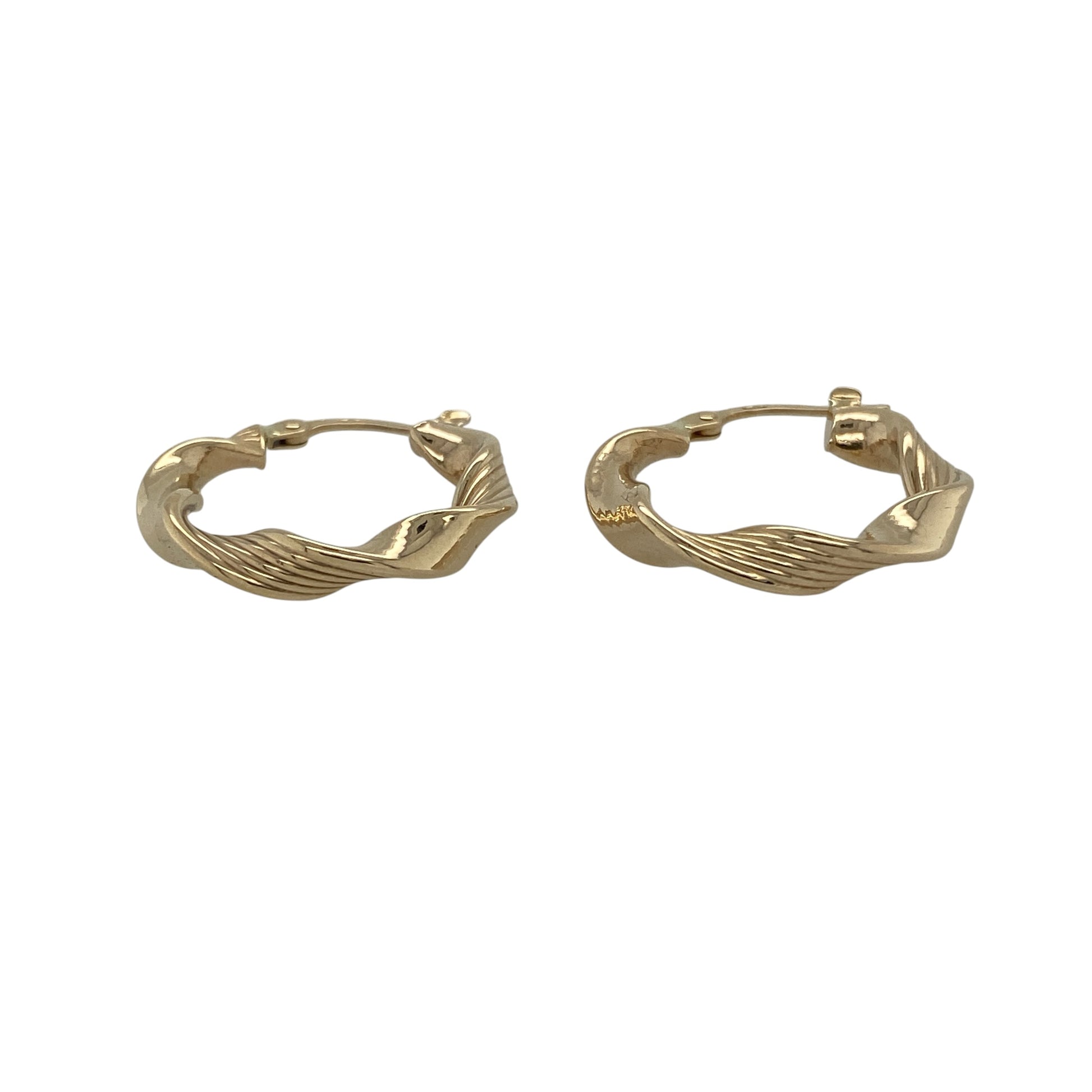 Add a touch of classic texture to your collection with these pre-owned 9ct yellow gold twisted hoop creole earrings—an elegant and versatile pair perfect for everyday wear.

Design: The earrings feature a traditional hoop creole shape with a twisted pattern, creating subtle movement and light-catching detail for a refined finish.
Material: Made from 9-carat yellow gold, the polished finish enhances the warmth of the metal while highlighting the twist design.