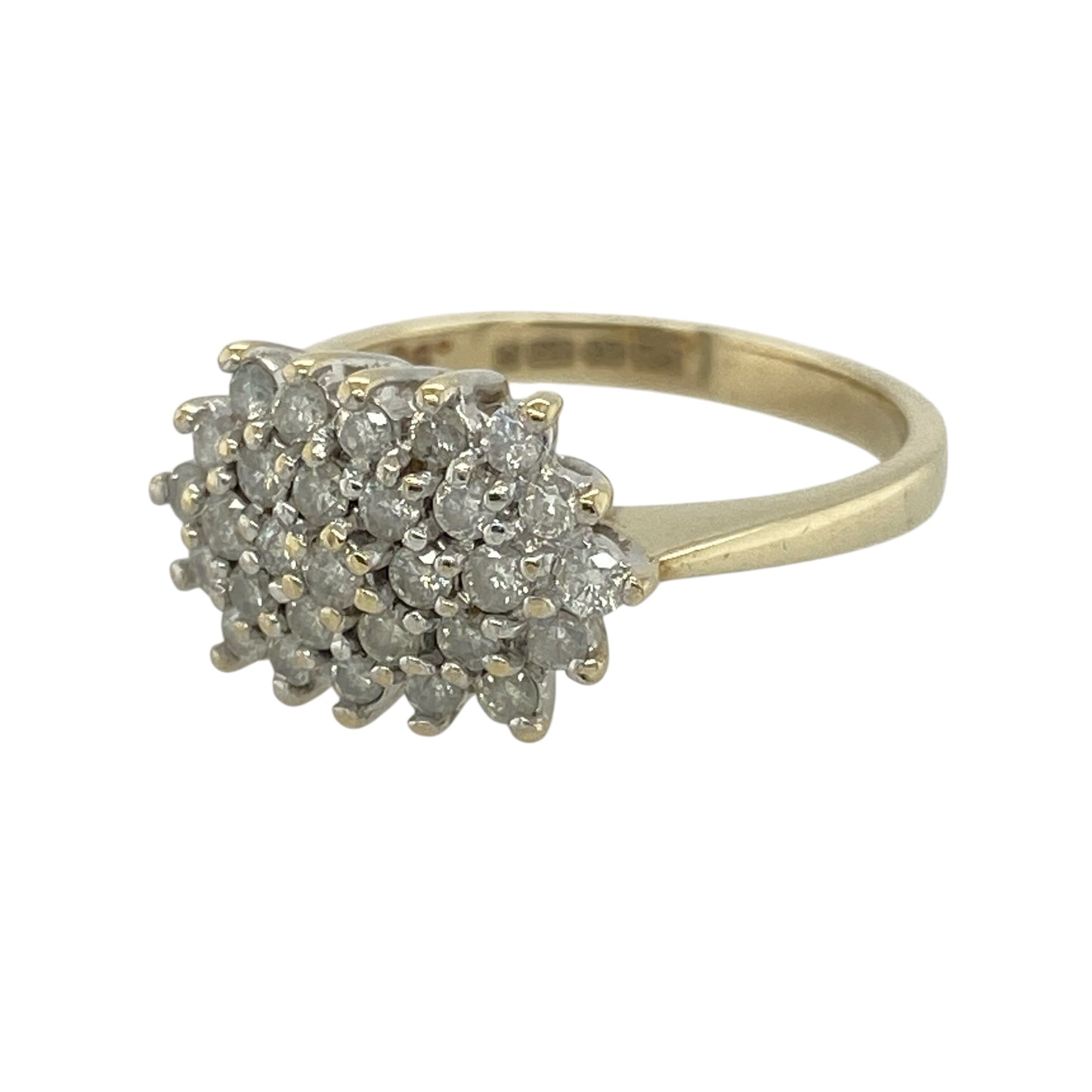 Add classic sparkle and timeless style to your collection with this pre-owned 9ct yellow gold diamond set cluster ring—an elegant piece with a bright and eye-catching finish.

Design: The ring features a cluster of sparkling diamonds forming a striking front measuring approximately 9mm in height, creating a bold yet refined focal point.
Material: Made from 9-carat yellow gold, the polished finish enhances the warmth of the metal while complementing the brilliance of the diamonds.
