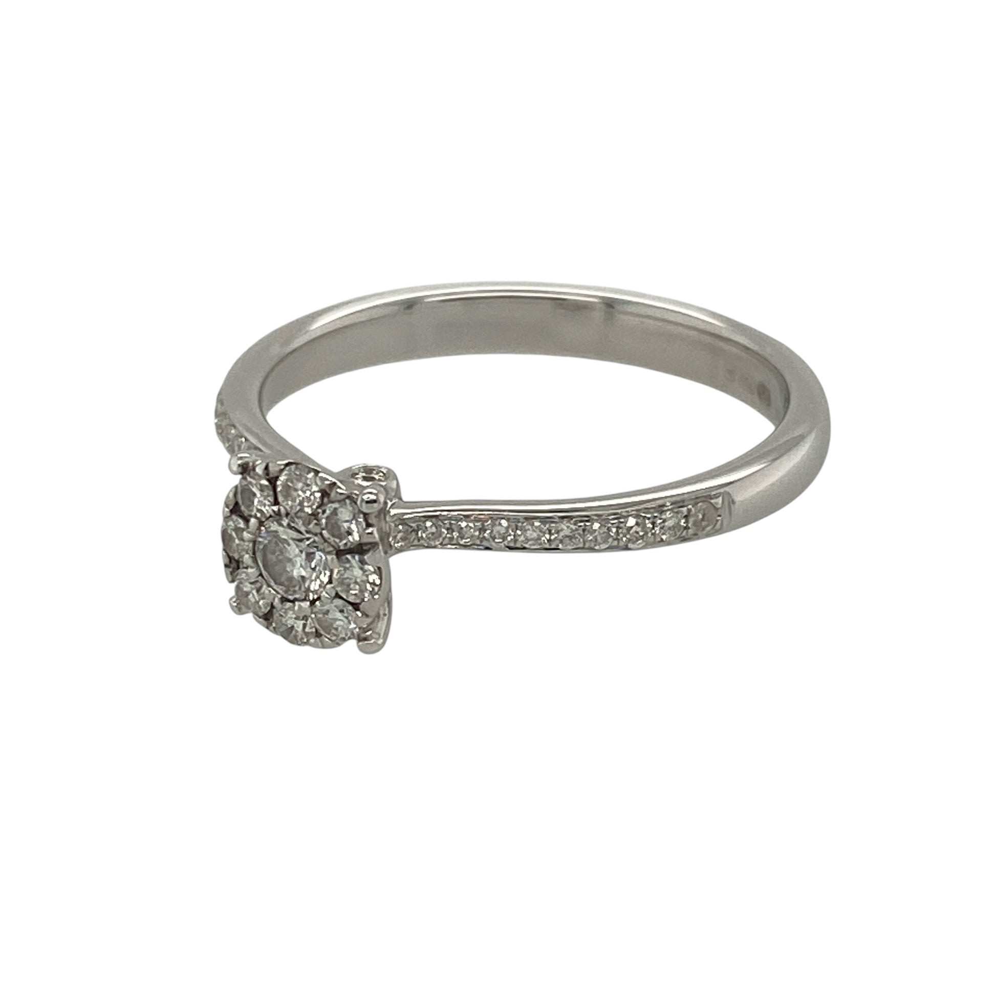 Add refined sparkle and timeless elegance to your collection with this pre-owned 18ct white gold diamond set cluster ring—an eye-catching piece with classic appeal.

Design: The ring features a diamond cluster front measuring approximately 6mm in height, with additional diamonds set along the shoulders to enhance brilliance and create a well-balanced, sparkling look.