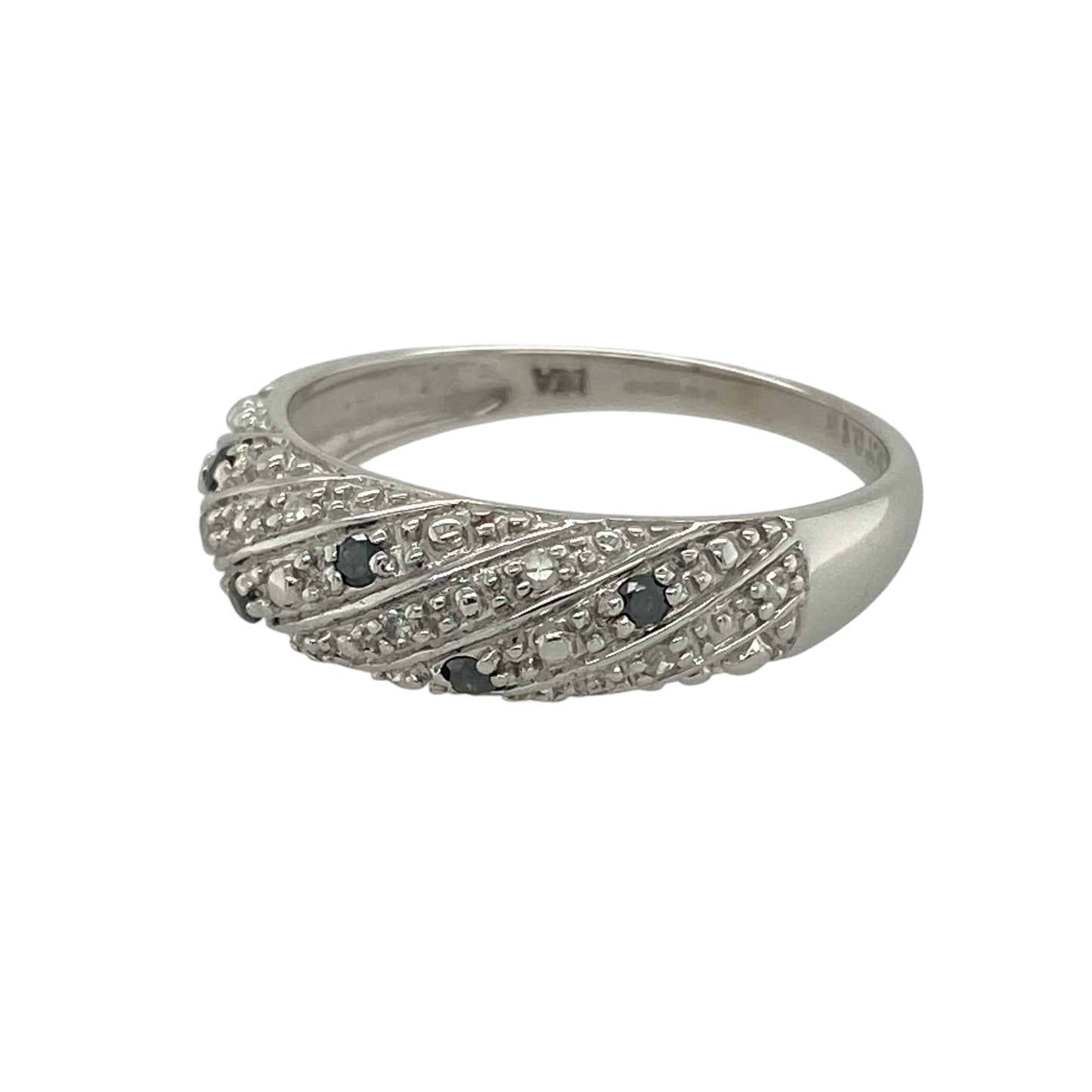 Add striking contrast and contemporary style to your collection with this pre-owned 9ct white gold white and black diamond set twisted band ring—an eye-catching piece with modern appeal.

Design: The ring features a twisted band style with a 6mm wide front, set with a mix of white and black diamonds that create a bold and distinctive contrast.