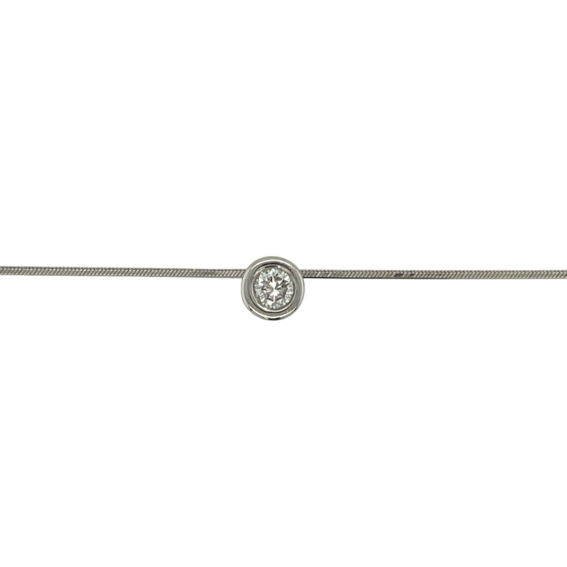 Add timeless elegance and refined sparkle to your collection with this pre-owned 18ct white gold diamond set solitaire pendant on a snake chain necklace—an effortlessly sophisticated piece perfect for any occasion.

Design: The necklace features a classic solitaire pendant set with a diamond of approximately 0.25ct, creating a clean and elegant focal point that highlights its natural brilliance.