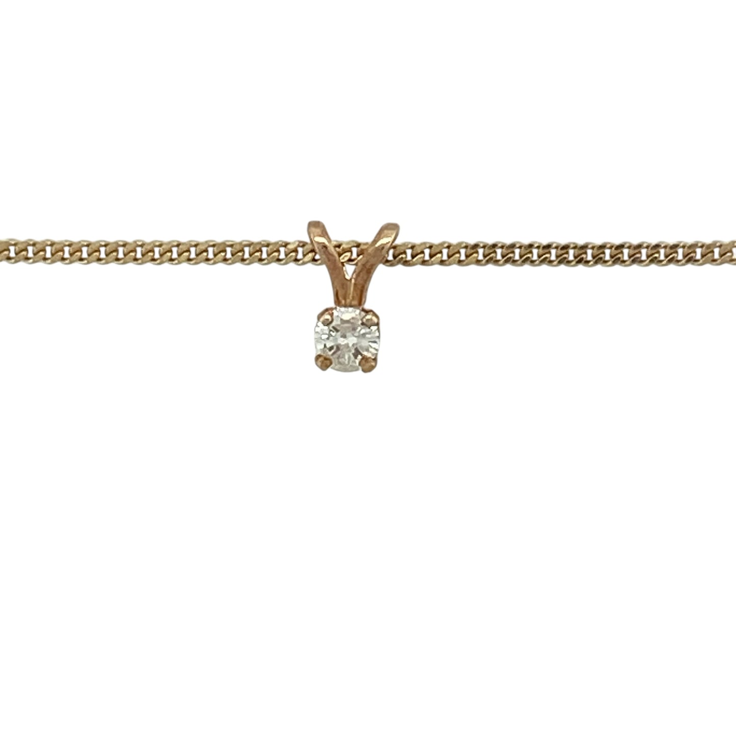 Add timeless sparkle and understated elegance to your collection with this pre-owned 9ct yellow gold diamond set solitaire pendant on a curb chain necklace—an effortlessly wearable piece for any occasion.

Design: The necklace features a delicate solitaire diamond pendant measuring approximately 7mm in length including the bail, creating a subtle yet eye-catching focal point.