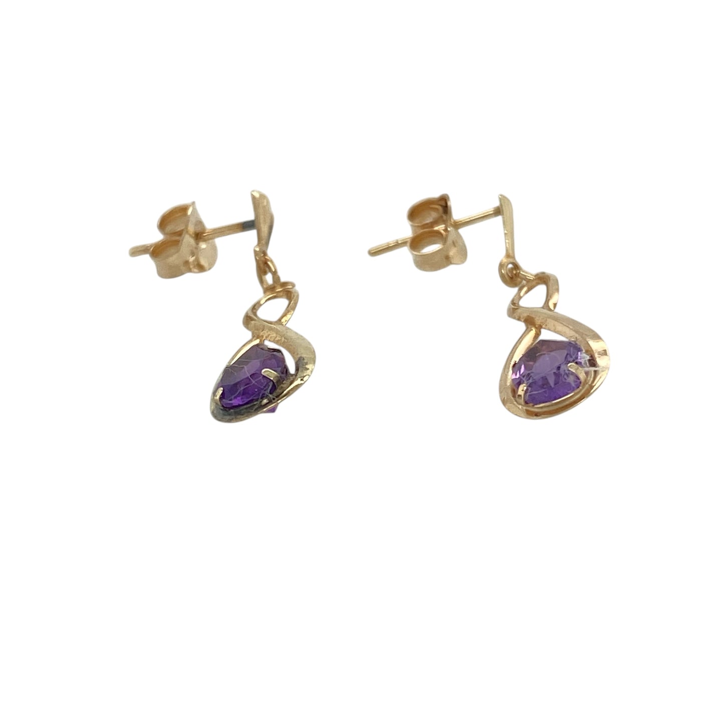 Add graceful movement and a touch of colour to your collection with these pre-owned 9ct yellow gold amethyst set teardrop infinity style drop earrings—an elegant and feminine pair with timeless appeal.

Design: The earrings feature a flowing infinity-inspired design leading to teardrop-shaped amethyst stones, each measuring approximately 6mm by 4mm, offering a soft purple hue and delicate movement.