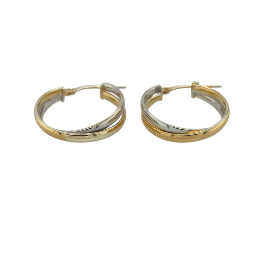 Add modern elegance and two-tone style to your collection with these pre-owned 9ct yellow and white gold crossover two strand oval creole earrings—an eye-catching pair with timeless appeal.

Design: The earrings feature an oval creole shape with a crossover two-strand design, creating a layered and flowing look that adds depth and visual interest.
Material: Made from 9-carat yellow and white gold, the contrasting tones enhance the design while offering a versatile and stylish finish.
