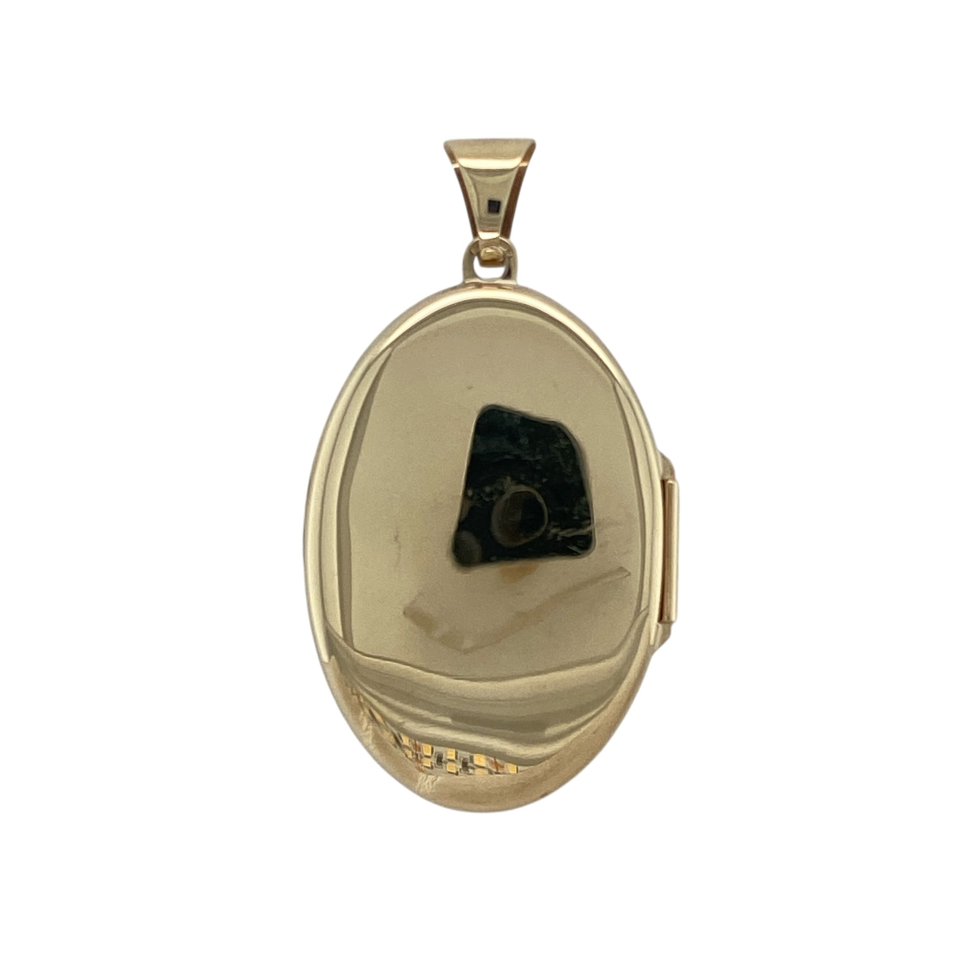 Add timeless elegance and sentimental charm to your collection with this pre-owned 9ct yellow gold patterned oval locket—an eye-catching piece designed to hold treasured memories.

Design: The locket features a classic oval shape with intricate patterned detailing on the front, creating a refined and decorative look with vintage-inspired appeal.
Material: Made from 9-carat yellow gold, the polished finish enhances the warmth of the metal while highlighting the detailed pattern.