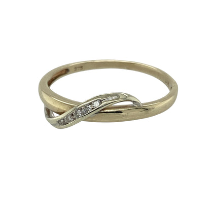 Add subtle sparkle and contemporary elegance to your collection with this pre-owned 9ct yellow and white gold diamond set twist band ring—an effortlessly stylish piece with timeless appeal.

Design: The ring features a graceful twist band design with a front measuring approximately 3mm in width, accented with sparkling diamonds that enhance its flowing shape.
Material: Made from 9-carat yellow and white gold, the two-tone finish highlights the twist detail while complementing the brilliance of the diamonds.