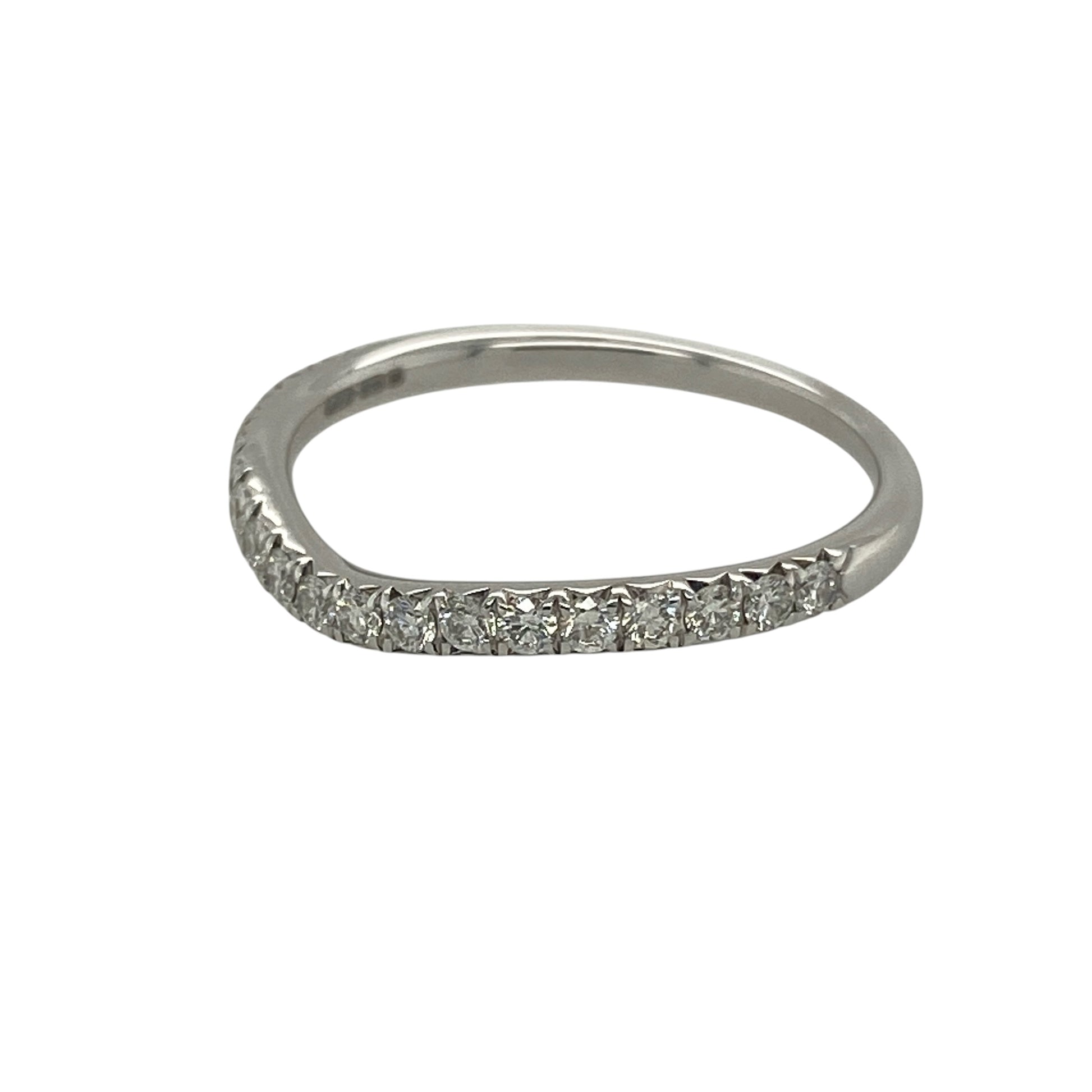 Add subtle sparkle and graceful design to your collection with this pre-owned 18ct white gold diamond set slight wishbone band ring—an elegant piece with timeless appeal.

Design: The ring features a delicate 2mm band with a gentle wishbone shape, accented with sparkling diamonds that follow the curve for a refined and flattering look.
Material: Made from 18-carat white gold, the polished finish enhances the cool tone of the metal while complementing the brilliance of the diamonds.