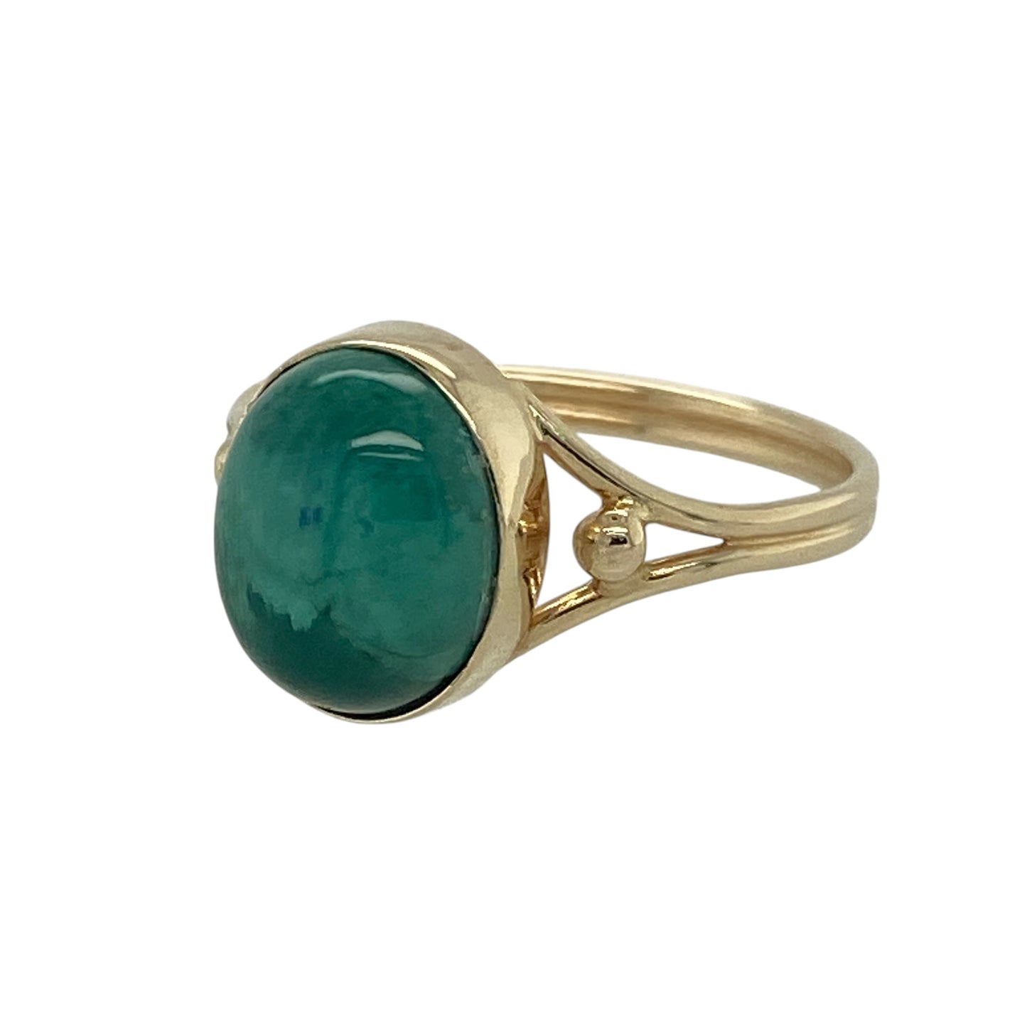 Add bold colour and smooth elegance to your collection with this pre-owned 14ct yellow gold green stone cabochon set solitaire ring—an eye-catching piece with timeless appeal.

Design: The ring features a 10mm by 8mm oval green cabochon stone, displaying a smooth, polished surface that enhances its rich and vibrant colour.
Material: Made from 14-carat yellow gold, the polished finish enhances the warmth of the metal while complementing the deep green tone of the stone.
