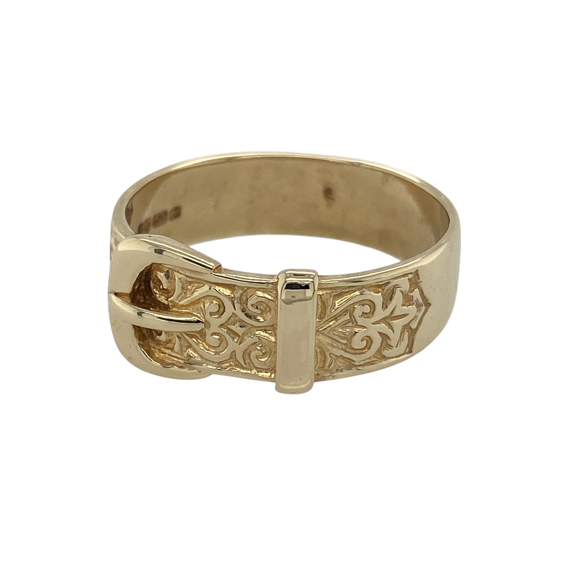 Add distinctive style and timeless character to your collection with this pre-owned 9ct yellow gold patterned buckle ring—an eye-catching piece with classic appeal.

Design: The ring features a detailed buckle motif at the front measuring approximately 9mm in width, finished with patterned detailing that adds texture and visual interest.
Material: Made from 9-carat yellow gold, the polished and textured finish enhances the warmth of the metal while highlighting the intricate design.