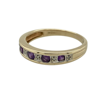 Add a touch of colour and elegant sparkle to your collection with this pre-owned 9ct yellow gold diamond and amethyst set band ring—an effortlessly stylish piece with timeless appeal.

Design: The ring features a 4mm wide band at the front, set with rich purple amethyst stones complemented by sparkling diamond accents, creating a balanced and eye-catching look.