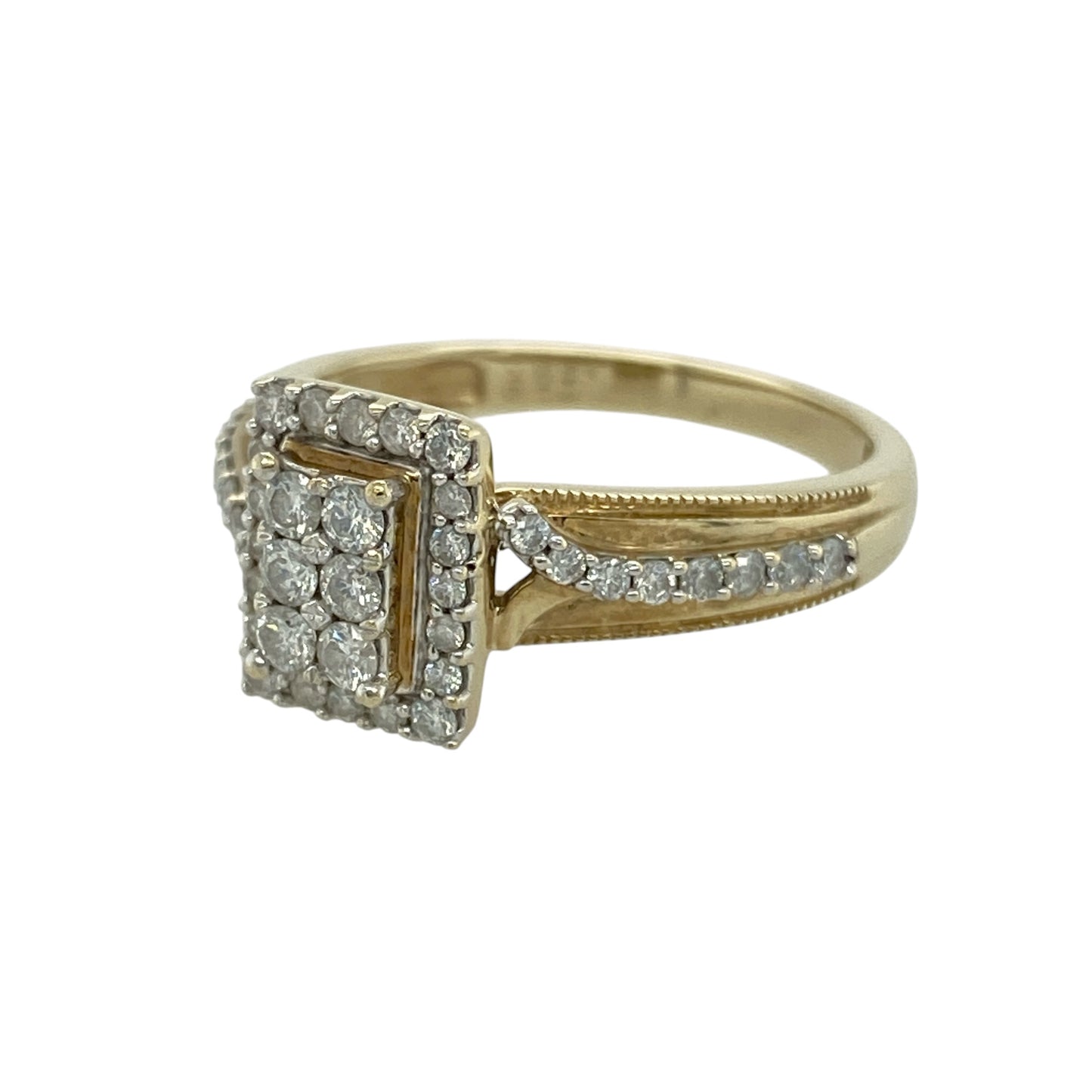 Add bold sparkle and refined elegance to your collection with this pre-owned 9ct yellow gold diamond set rectangle cluster halo ring—an eye-catching piece with timeless appeal.

Design: The ring features a rectangular cluster halo front measuring approximately 10mm in height, set with a combination of diamonds that create a bright and structured focal point, with additional diamonds set along the shoulders for enhanced brilliance.