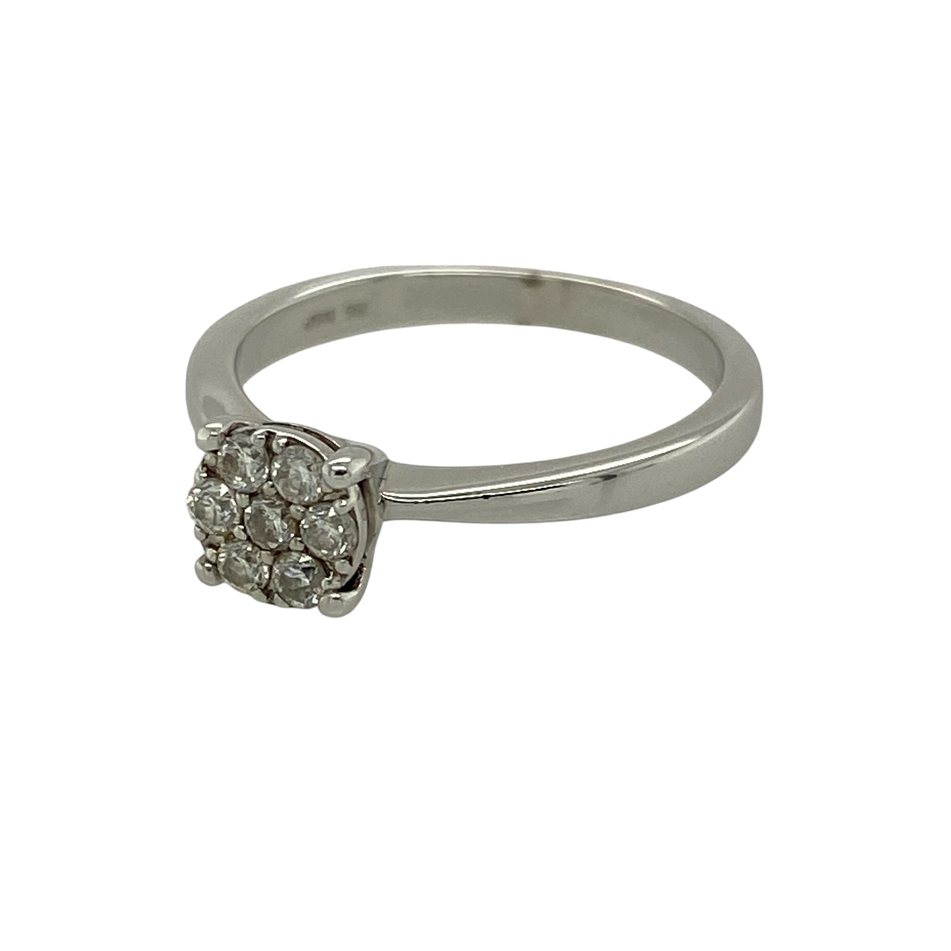 Add elegant sparkle and delicate floral charm to your collection with this pre-owned 9ct white gold diamond set illusion solitaire flower cluster ring—an effortlessly stylish piece with timeless appeal.

Design: The ring features a flower-inspired cluster head measuring approximately 6mm in height, with illusion-set diamonds totalling around 0.20ct, creating the look of a larger central stone with enhanced brilliance.