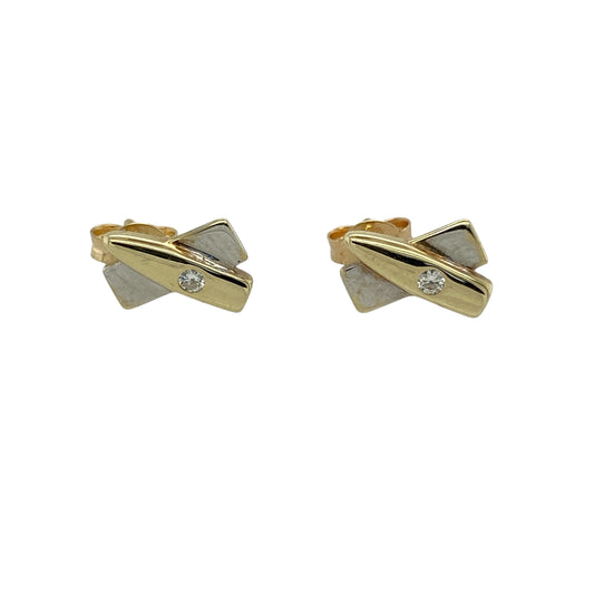 Add a touch of modern elegance to your collection with these pre-owned 9ct yellow and white gold diamond set kiss stud earrings—an effortlessly stylish pair with timeless appeal.

Design: The earrings feature a graceful kiss-style design, where two flowing strands cross over to create a soft and elegant shape, accented with sparkling diamonds for added brilliance.