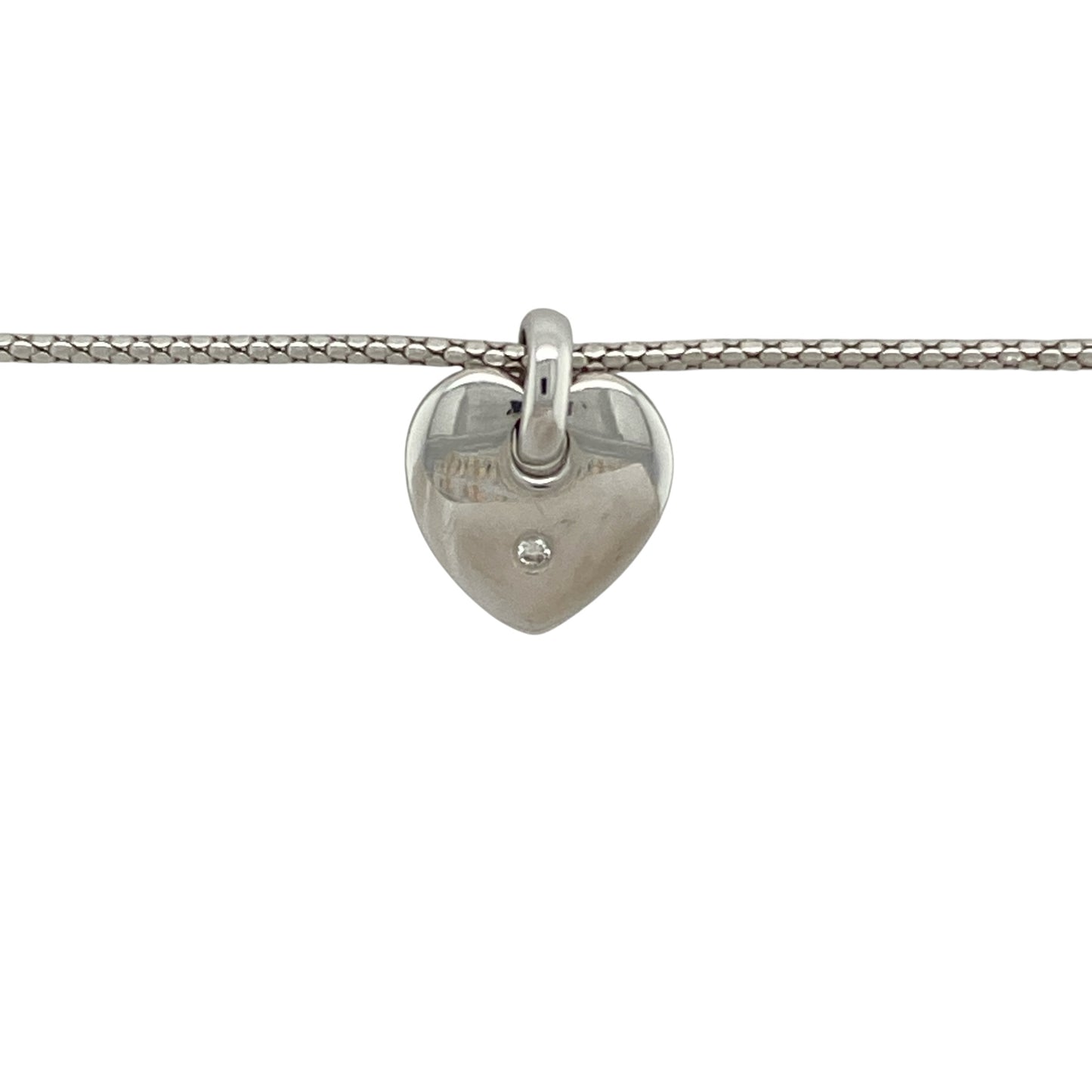 Add a touch of romance and timeless sparkle to your collection with this pre-owned 9ct white gold diamond set heart pendant on a snake chain necklace—an elegant piece with classic appeal.

Design: The necklace features a heart-shaped pendant measuring approximately 1.6cm in length including the bail, set with sparkling diamonds that create a bright and eye-catching finish.