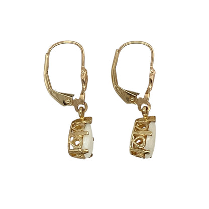 Add a soft shimmer and elegant movement to your collection with these pre-owned 9ct yellow gold opalique set teardrop drop earrings—an effortlessly stylish pair with timeless appeal.

Design: The earrings feature teardrop-shaped opalique stones measuring approximately 8mm by 5mm, offering a subtle iridescent glow that catches the light beautifully.
Material: Made from 9-carat yellow gold, the polished finish enhances the warmth of the metal while complementing the gentle shimmer of the opalique stones.