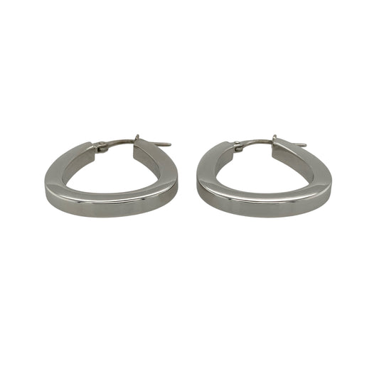 Add a modern twist to a classic style with these pre-owned 9ct white gold squared oval creole earrings—an effortlessly stylish pair with contemporary appeal.

Design: The earrings feature a squared oval creole shape, offering a structured and geometric look that sets them apart from traditional hoops while maintaining a sleek silhouette.
Material: Made from 9-carat white gold, the polished finish enhances the cool tone of the metal and adds a clean, refined shine.