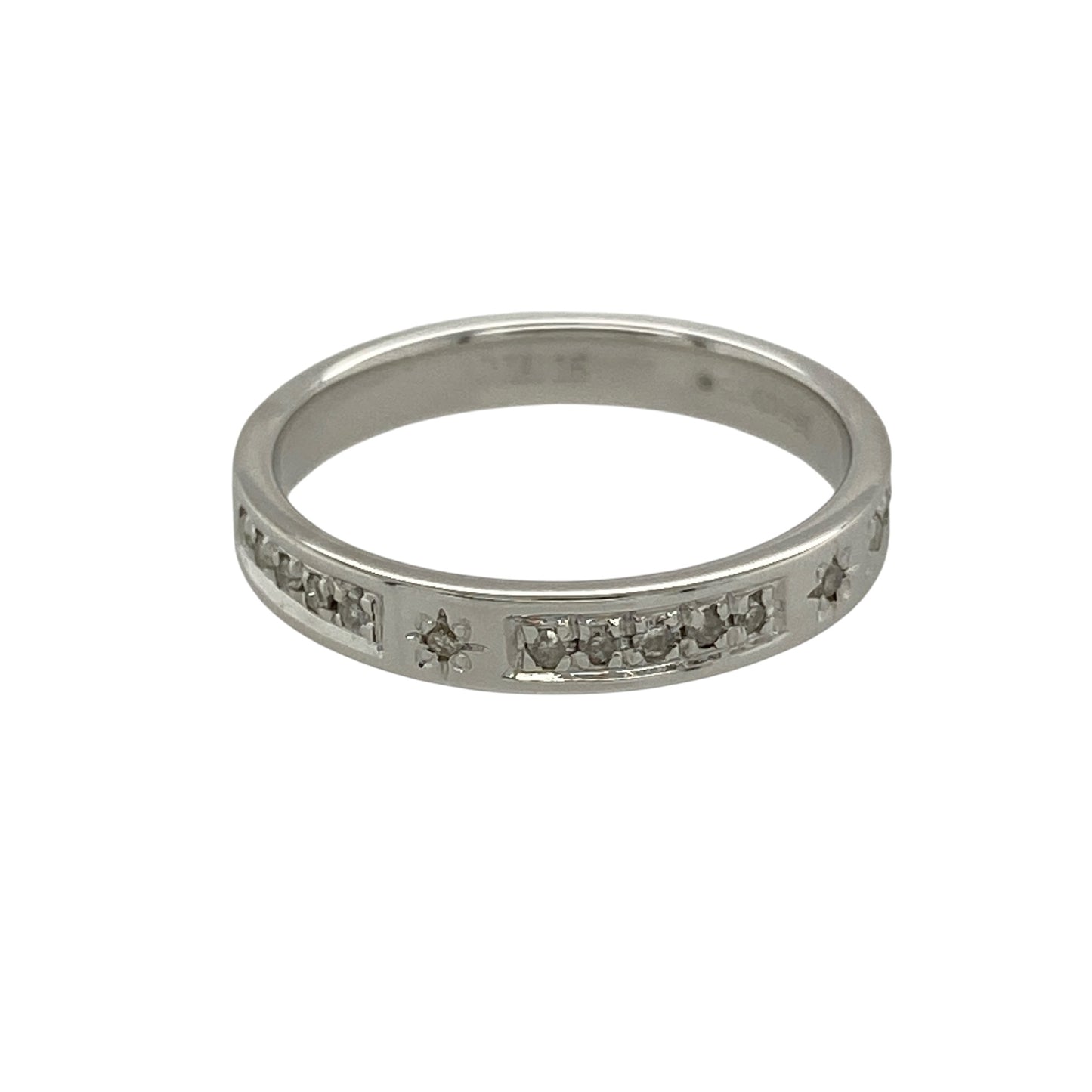 Add subtle sparkle and timeless elegance to your collection with this pre-owned 9ct white gold diamond set band ring—an effortlessly stylish piece with classic appeal.

Design: The ring features a 3mm wide band at the front, set with sparkling diamonds that create a refined and eye-catching finish.
Material: Made from 9-carat white gold, the polished finish enhances the cool tone of the metal while complementing the brilliance of the diamonds.