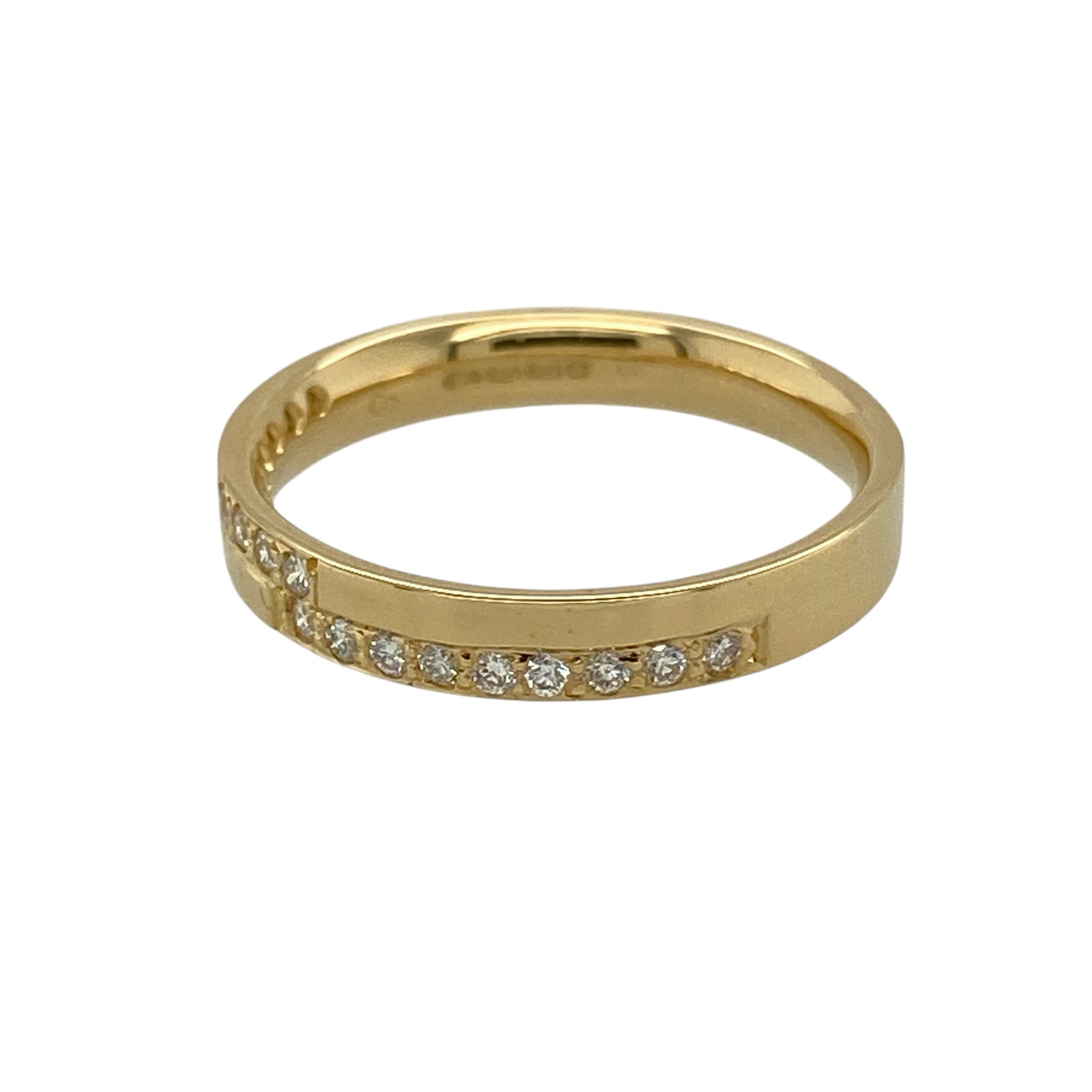 Add refined sparkle and timeless elegance to your collection with this pre-owned 18ct yellow gold diamond set band ring—an effortlessly stylish piece with classic appeal.

Design: The ring features a slim band measuring approximately 3mm at the front, set with sparkling diamonds that create a bright and elegant finish.
Material: Made from 18-carat yellow gold, the polished finish enhances the rich warmth of the metal while complementing the brilliance of the diamonds.