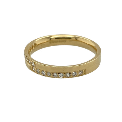 Add refined sparkle and timeless elegance to your collection with this pre-owned 18ct yellow gold diamond set band ring—an effortlessly stylish piece with classic appeal.

Design: The ring features a slim band measuring approximately 3mm at the front, set with sparkling diamonds that create a bright and elegant finish.
Material: Made from 18-carat yellow gold, the polished finish enhances the rich warmth of the metal while complementing the brilliance of the diamonds.